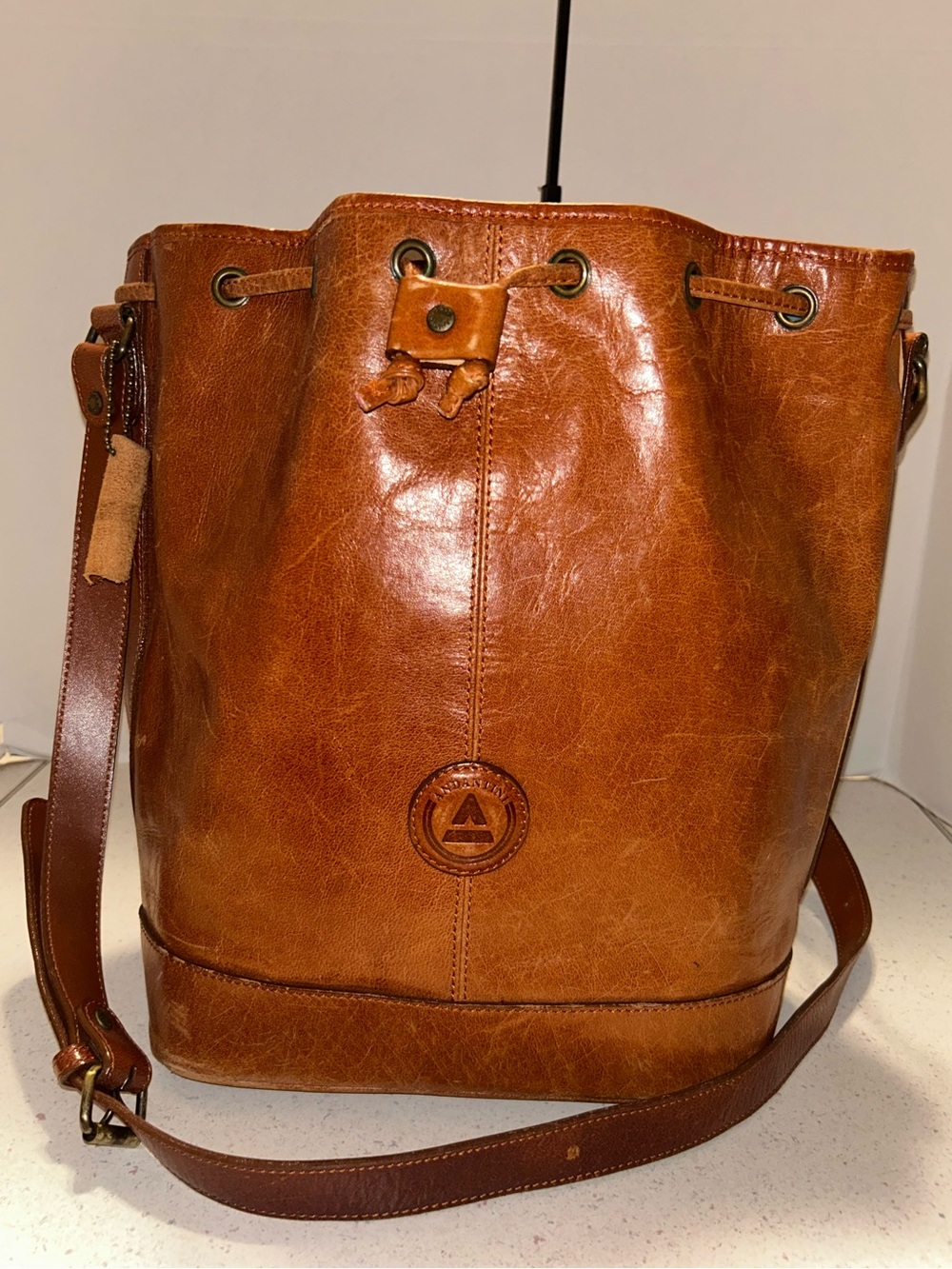 Andantini Bucket Crossbody Bag in Cognac Brown